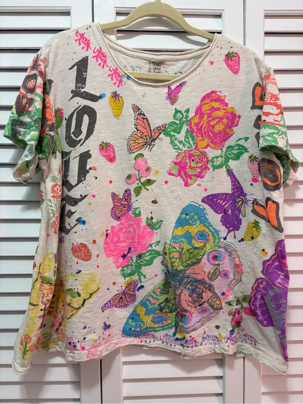 Magnolia Pearl Cream Tee with Neon Butterfly & Floral Graphics